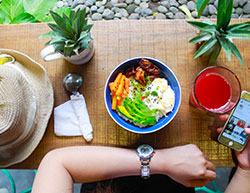 person sitting in front of a healthy meal